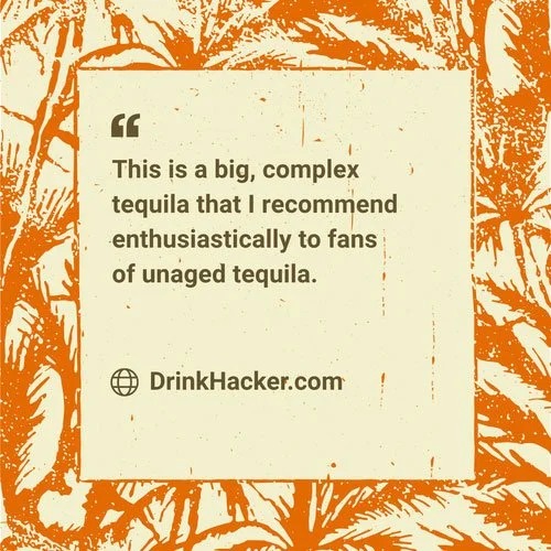Jay Baer tequila reviewer holding Cachasol bottles